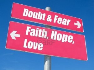 9156157-faith-hope-love-vs-doubt-fear-signpost-against-blue-sky